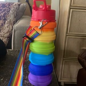 A colorful retractable on the go drinking container